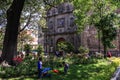 Kids playing around a street market by a church, Guadalajara, Jalisco, Mexico Royalty Free Stock Photo